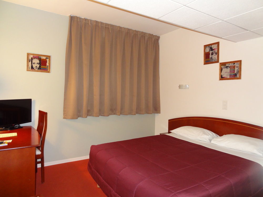 Cit'Hotel De La Marne Тарб Екстериор снимка